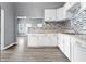 Bright kitchen with stainless steel appliances and seamless flow to the dining area at 917 S Grant St, Muncie, IN 47302