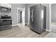 Efficient kitchen with stainless steel appliances and well-organized storage at 917 S Grant St, Muncie, IN 47302