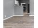 Open-concept design with neutral paint, and seamless flow from living to kitchen space at 917 S Grant St, Muncie, IN 47302