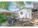 Backyard patio features a brick surface and cozy seating perfect for outdoor gatherings at 1021 N Bolton Ave, Indianapolis, IN 46219