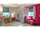 Charming ' bedroom with colorful decor, whimsical accents, and ample storage space at 1021 N Bolton Ave, Indianapolis, IN 46219