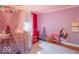 Playful bedroom featuring whimsical decor, vibrant colors, and a cozy canopy bed at 1021 N Bolton Ave, Indianapolis, IN 46219