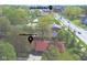 Aerial view showcases 11 Woodacre close to the Arts District, surrounded by lush greenery at 11 Woodacre Dr, Carmel, IN 46032