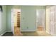 Bedroom with an open closet and walk-in bathroom. Perfect and accessible at 11 Woodacre Dr, Carmel, IN 46032