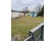 This backyard features two storage sheds and plenty of space for outdoor activities at 1102 Branifield Ct, Franklin, IN 46131