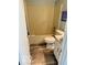Bathroom with wood-look flooring, toilet and tub/shower combination at 1102 Branifield Ct, Franklin, IN 46131
