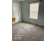 Bedroom featuring plush carpeting and a sunlit window with blinds at 1102 Branifield Ct, Franklin, IN 46131