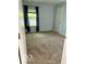 Bedroom featuring plush carpeting and a sunlit window with blinds at 1102 Branifield Ct, Franklin, IN 46131