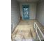 Covered entryway with a blue front door and accessibility features at 1102 Branifield Ct, Franklin, IN 46131