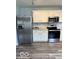 Bright kitchen featuring white cabinets, stainless steel appliances, and updated backsplash at 1102 Branifield Ct, Franklin, IN 46131