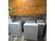 Laundry room with washer, dryer, and wall storage cabinets at 1102 Branifield Ct, Franklin, IN 46131
