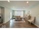 Bright dining room with modern table, chairs, buffet, and decor at 1115 Freshwater Ln, Cicero, IN 46034