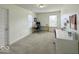 Bright home office with dual desks, natural light, and carpeting at 1115 Freshwater Ln, Cicero, IN 46034