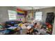 Bedroom with a rainbow flag, many decorations and natural light from two windows at 1126 Kings Ct, Indianapolis, IN 46260