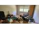 Bedroom featuring laminate flooring and a window for natural light at 1126 Kings Ct, Indianapolis, IN 46260