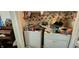 Functional laundry room needing some tidying with washer and dryer hookups at 1126 Kings Ct, Indianapolis, IN 46260