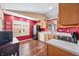 Cozy kitchen with ample counter space, stainless appliances and white double sink at 1127 Alydar Cir, Indianapolis, IN 46217