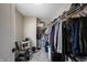 Walk-in closet with ample storage and organizational space for clothing and accessories at 11592 Saltford Ln, Fishers, IN 46037