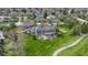Luxurious estate with a large patio, lush lawn, meticulously landscaped gardens, and charming walking path at 12010 Landover Ln, Fishers, IN 46037