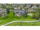 Serene estate with a manicured lawn, landscaped gardens, walking path, and private backyard at 12010 Landover Ln, Fishers, IN 46037