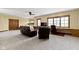 This expansive finished basement includes entertainment and lounge areas at 12010 Landover Ln, Fishers, IN 46037