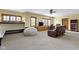 This expansive finished basement includes entertainment and lounge areas for relaxation at 12010 Landover Ln, Fishers, IN 46037