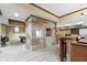 Finished basement boasts stone fireplace, pool table, and bar area for entertaining at 12010 Landover Ln, Fishers, IN 46037