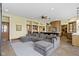 Open living area with kitchen, comfortable seating and large windows offer great views at 12010 Landover Ln, Fishers, IN 46037