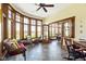 Relaxing sunroom boasts natural light and peaceful views, perfect for unwinding at 12010 Landover Ln, Fishers, IN 46037