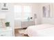 Bright bedroom featuring light walls, ample natural light from the windows, and tasteful decor at 1209 N Downey Ave, Indianapolis, IN 46219