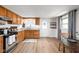 Charming kitchen with stainless steel appliances and ample cabinet space at 1212 N 10Th St, Elwood, IN 46036