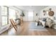 Bright living room with hardwood floors, neutral tones, and ample natural light at 1212 N 10Th St, Elwood, IN 46036