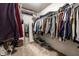 Organized walk-in closet with ample shelving and hanging space for efficient storage at 12210 Doncaster Ct, Fishers, IN 46037