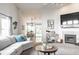 Inviting living room open to the dining area, filled with natural light at 12210 Doncaster Ct, Fishers, IN 46037