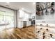 Bright, modern kitchen with stainless steel appliances and seamless access to an outdoor seating area at 12577 Pointer Pl, Fishers, IN 46038