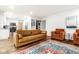 Spacious living room with open floor plan and lots of seating to make you feel at home at 12577 Pointer Pl, Fishers, IN 46038
