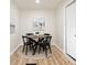 Cozy dining room featuring a round table, four chairs, and modern decor at 1295 Rolling Ridge Dr, Noblesville, IN 46060