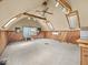 Unique bonus room featuring wood paneling, ample natural light, and carpet flooring, perfect for flexible living at 1394 N Michigan Rd, Shelbyville, IN 46176