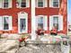 Inviting front porch with rocking chairs, offering a relaxing outdoor space and classic charm at 1394 N Michigan Rd, Shelbyville, IN 46176