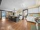 Spacious kitchen featuring dark wood island with seating, complemented by white cabinets and an open layout at 1394 N Michigan Rd, Shelbyville, IN 46176