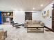 Comfortable living room with a fireplace, plush carpeting, and cozy seating arrangement for relaxed gatherings at 1394 N Michigan Rd, Shelbyville, IN 46176