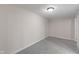 Finished basement room with new flooring and a neutral color palette at 1627 Lawton Ave, Indianapolis, IN 46203