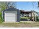 Backyard view of the detached garage and carport at 1627 Lawton Ave, Indianapolis, IN 46203