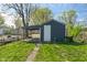 Backyard view of the detached garage and carport at 1627 Lawton Ave, Indianapolis, IN 46203