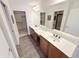 Bright primary bathroom featuring double sink vanity and walk-in closets at 16924 Maple Springs Way, Westfield, IN 46074