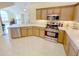 A modern kitchen with stainless steel appliances and bright countertops, ready for cooking and entertaining at 16924 Maple Springs Way, Westfield, IN 46074
