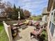 Stone patio features multiple seating areas, providing an ideal outdoor space at 16924 Maple Springs Way, Westfield, IN 46074