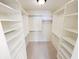 Walk-in closet with open shelving and hanging rods for organized storage at 16924 Maple Springs Way, Westfield, IN 46074