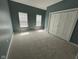 Bedroom showcasing two windows and a closet, offering plenty of natural light and storage space at 1824 Spann Ave, Indianapolis, IN 46203