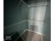 Walk-in closet featuring wire shelving, soft gray carpet and neutral gray walls at 1824 Spann Ave, Indianapolis, IN 46203